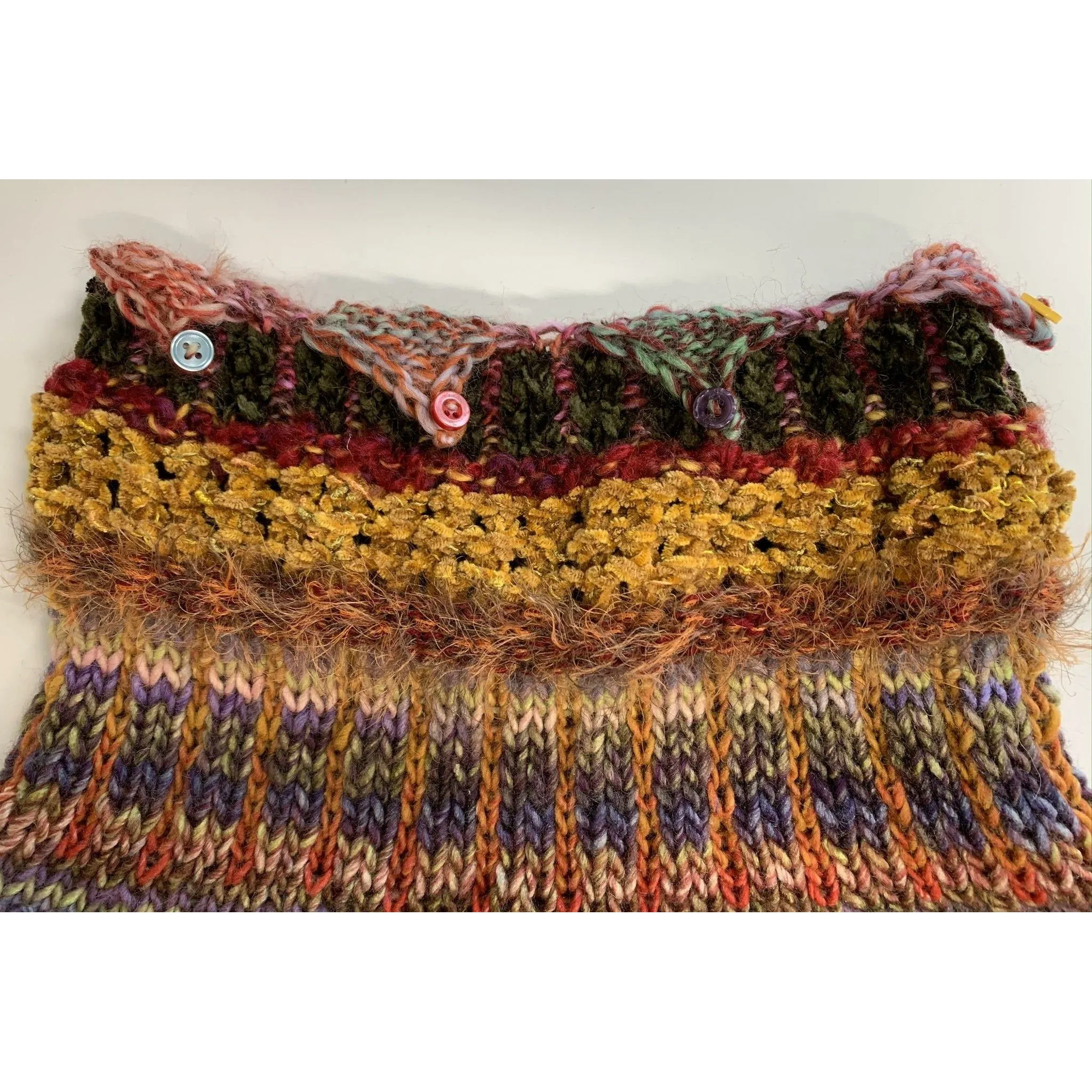 Handknit circular neck scarves in many colors and knit stitches to lend lots of textures and warmth