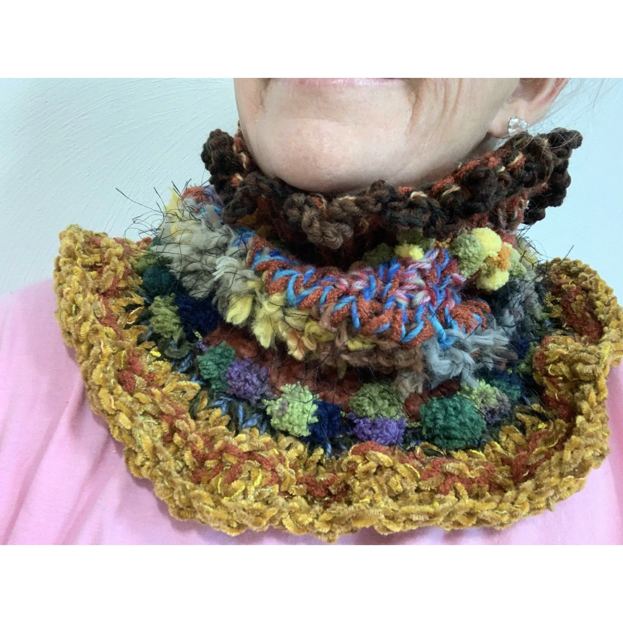 Handknit circular neck scarves in many colors and knit stitches to lend lots of textures and warmth