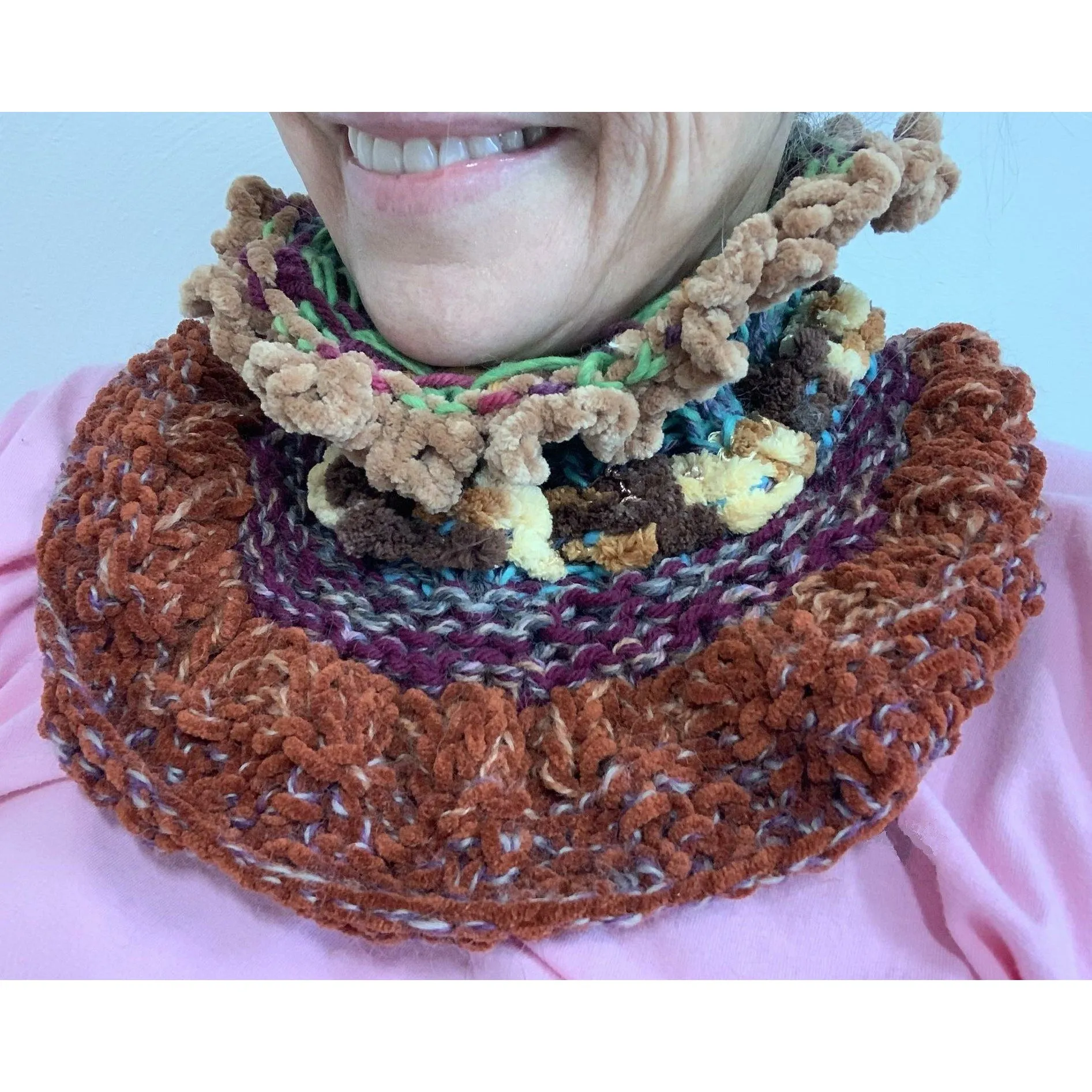 Handknit circular neck scarves in many colors and knit stitches to lend lots of textures and warmth