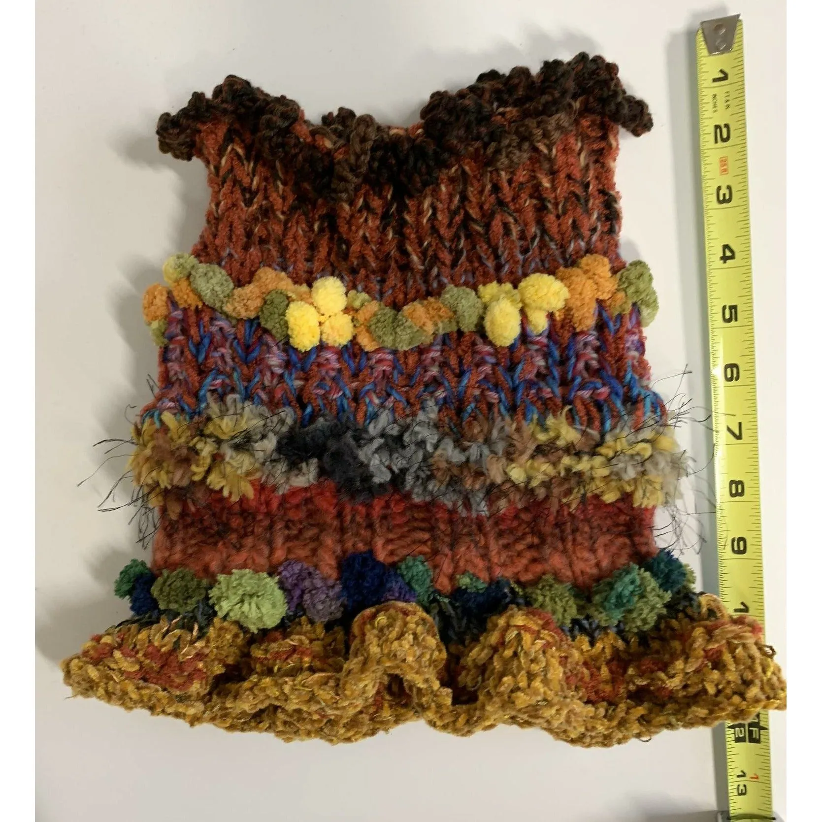 Handknit circular neck scarves in many colors and knit stitches to lend lots of textures and warmth